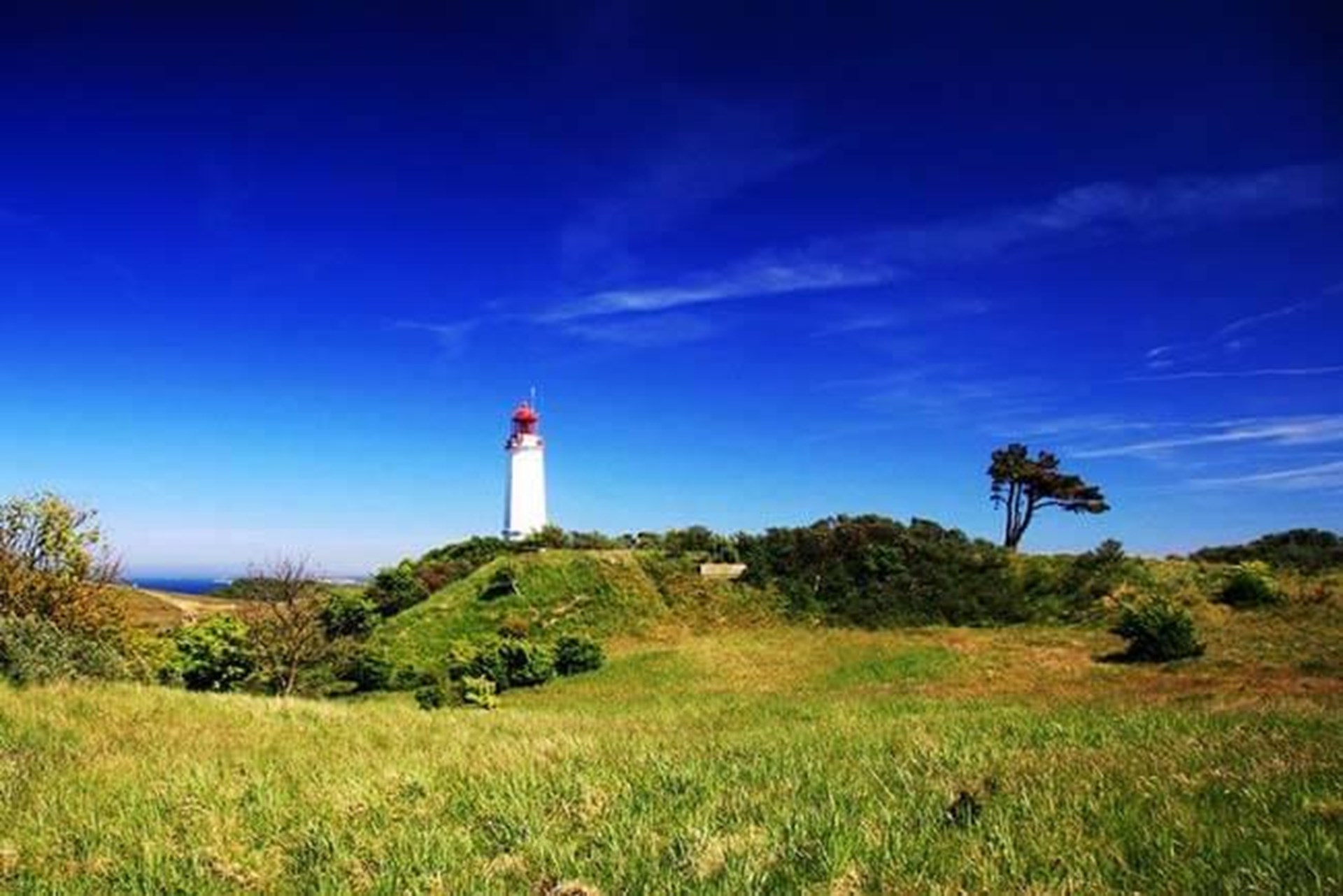 Landschaft mit Leuchtturm